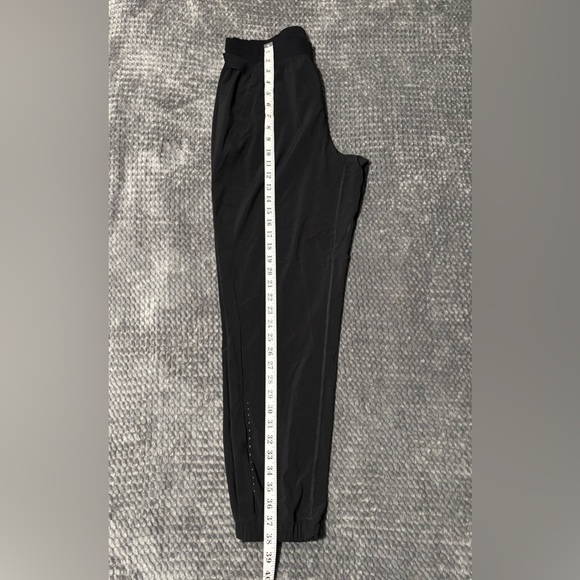 Lululemon Surge Jogger, Black Jogger Pants Size 8 - Picture 3 of 7